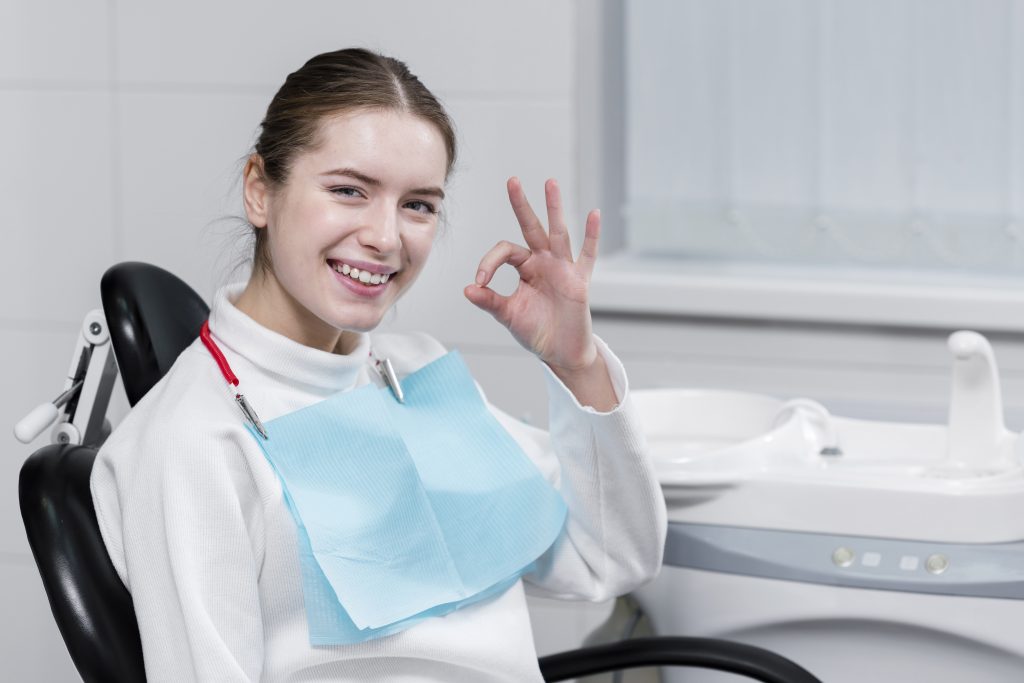 Happy patient after pain-free dental procedure